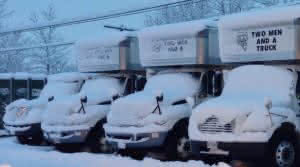 Trucks covered in snow