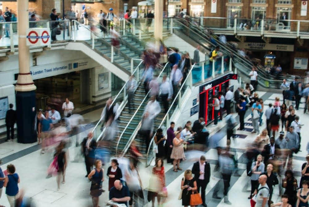 People moving through busy corridors 